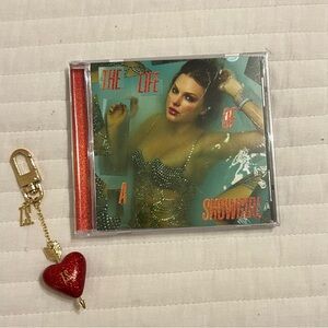 Taylor Swift The Life Of A Showgirl CD & Sparkly Heart T.S. Bagcharm Keychain